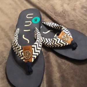 Never worn Unisea flip flops